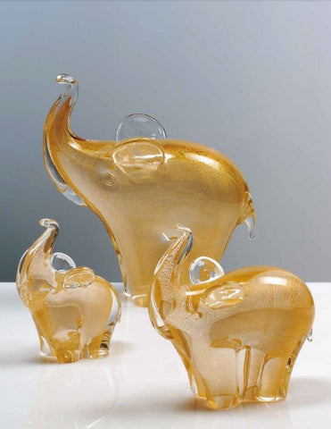Family of three elephants with gold