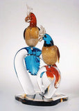 Murano glass parrots on a crystal base