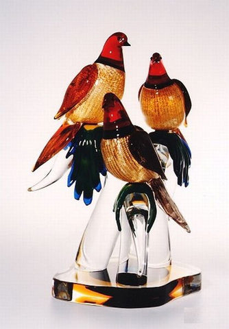 Colourful Murano glass doves on a crystal base