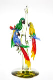 Murano glass parrots on a tree