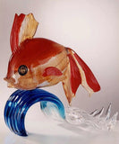 Murano glass goldfish on a blue crystal wave