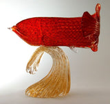 Fish in red with 24 carat gold