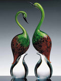 Pair of Murano glass herons in red and green