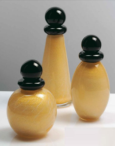 Collectable perfume bottles in milk and gold
