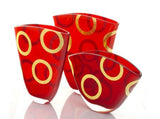 Red and blue vases with gold circles