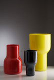 Asymmetric vases in coral, black and yellow