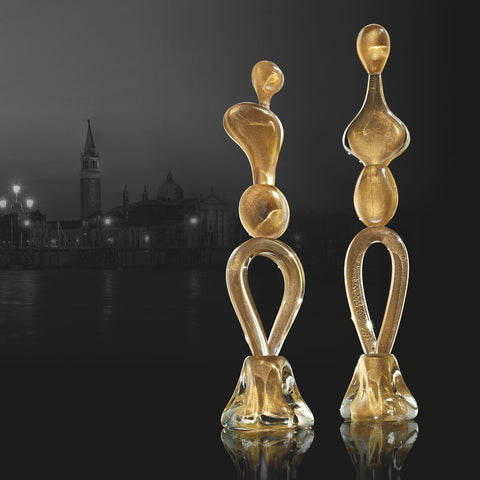 Male and female figurines in golden Murano glass